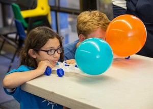 Girl and Boy with Balloon Experiment